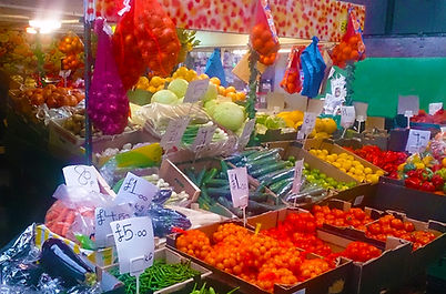 Stall side view with various fruits and vegetables