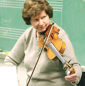The founder of the Hunterdon Symphony, Nancy Roth, playing the violin.
