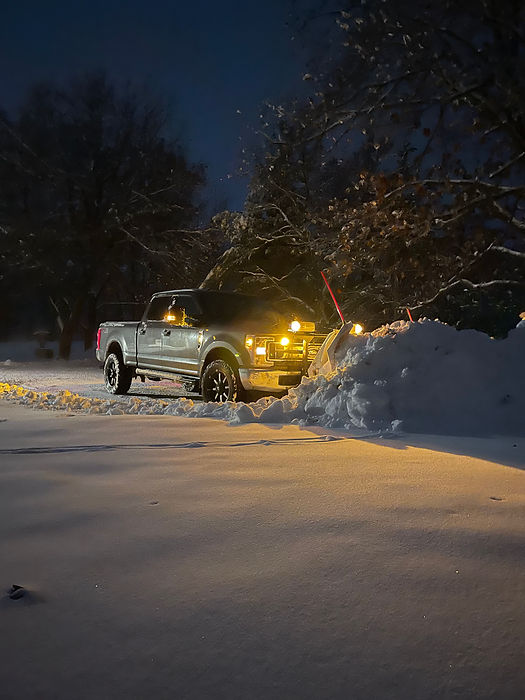 Plowing snow after a snow storm