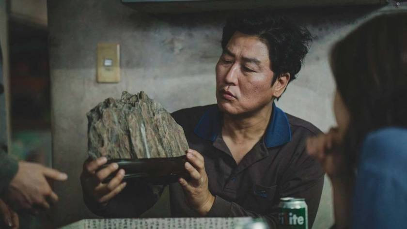 Ki-taek from movie Parasite with the scholar’s stone