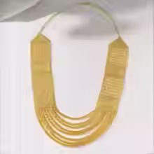 A luxurious handmade gold-plated pendant with an elegant tassel chain