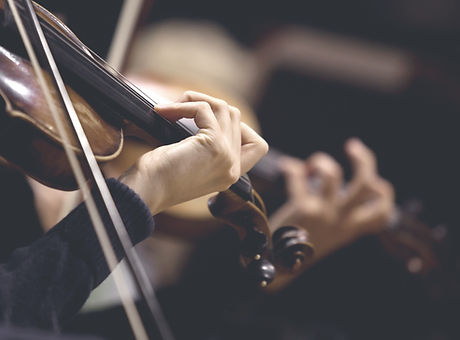 The girl's hand on the strings of a viol
