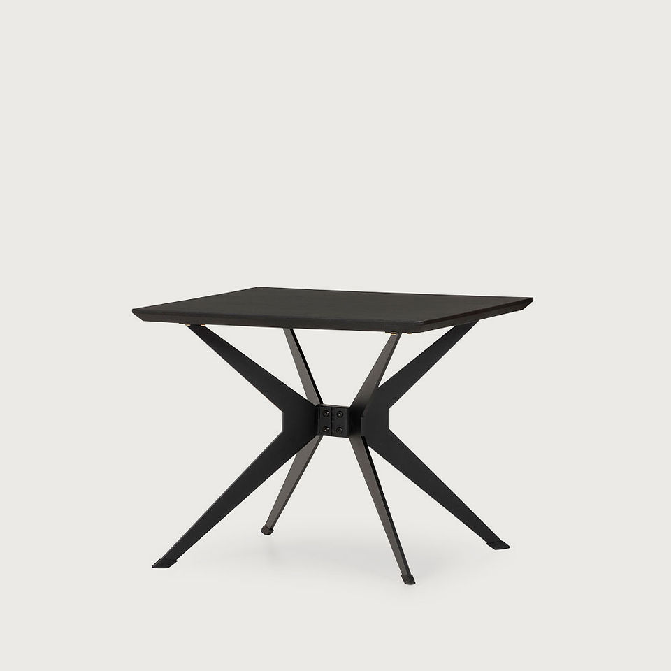 black side table with splayed legs 