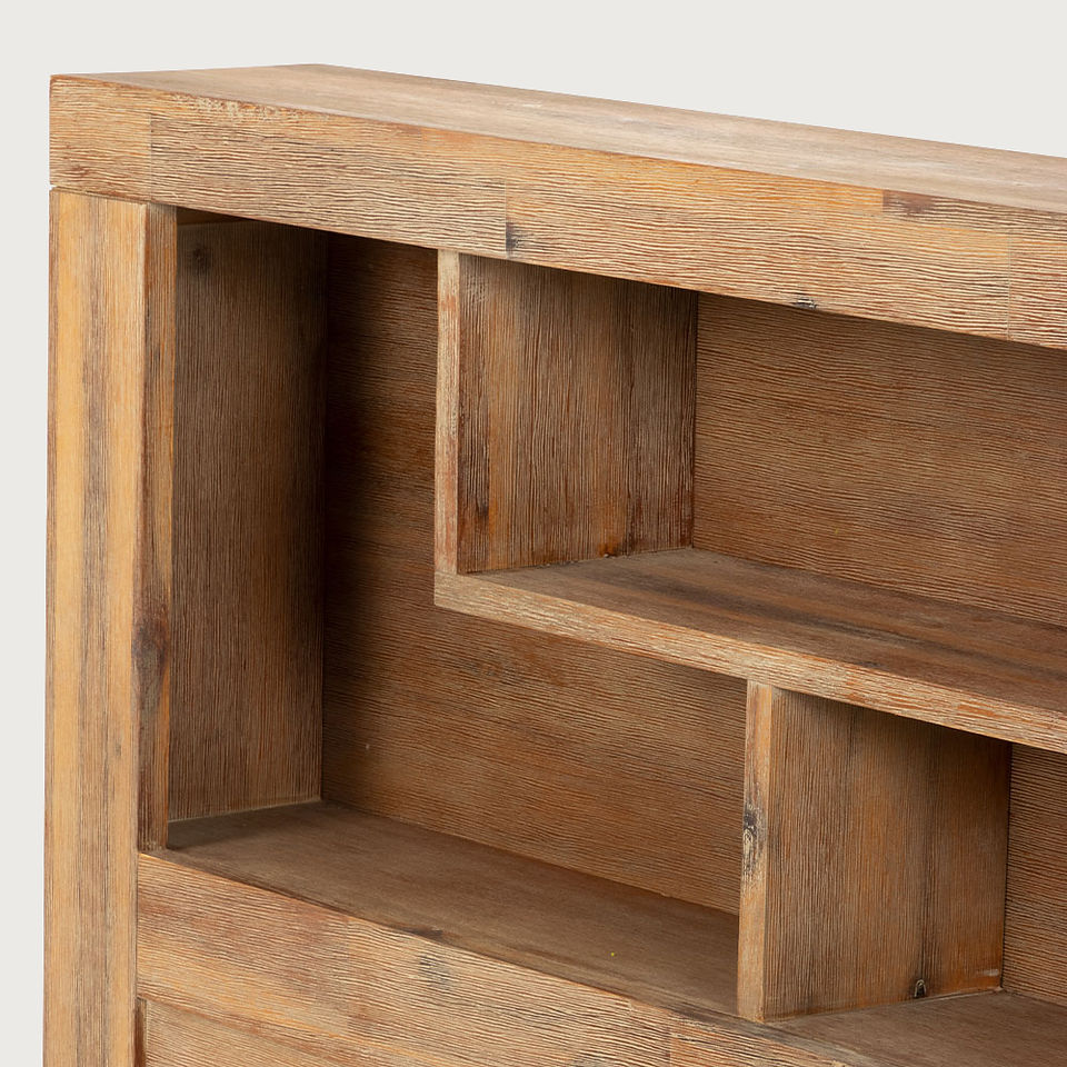 Wooden headboard with shelves close up