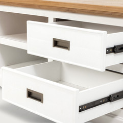 White pine entertainment unit with open drawers 