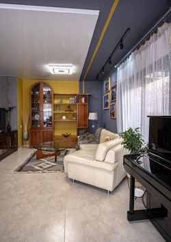 Two colored walls with a ceiling