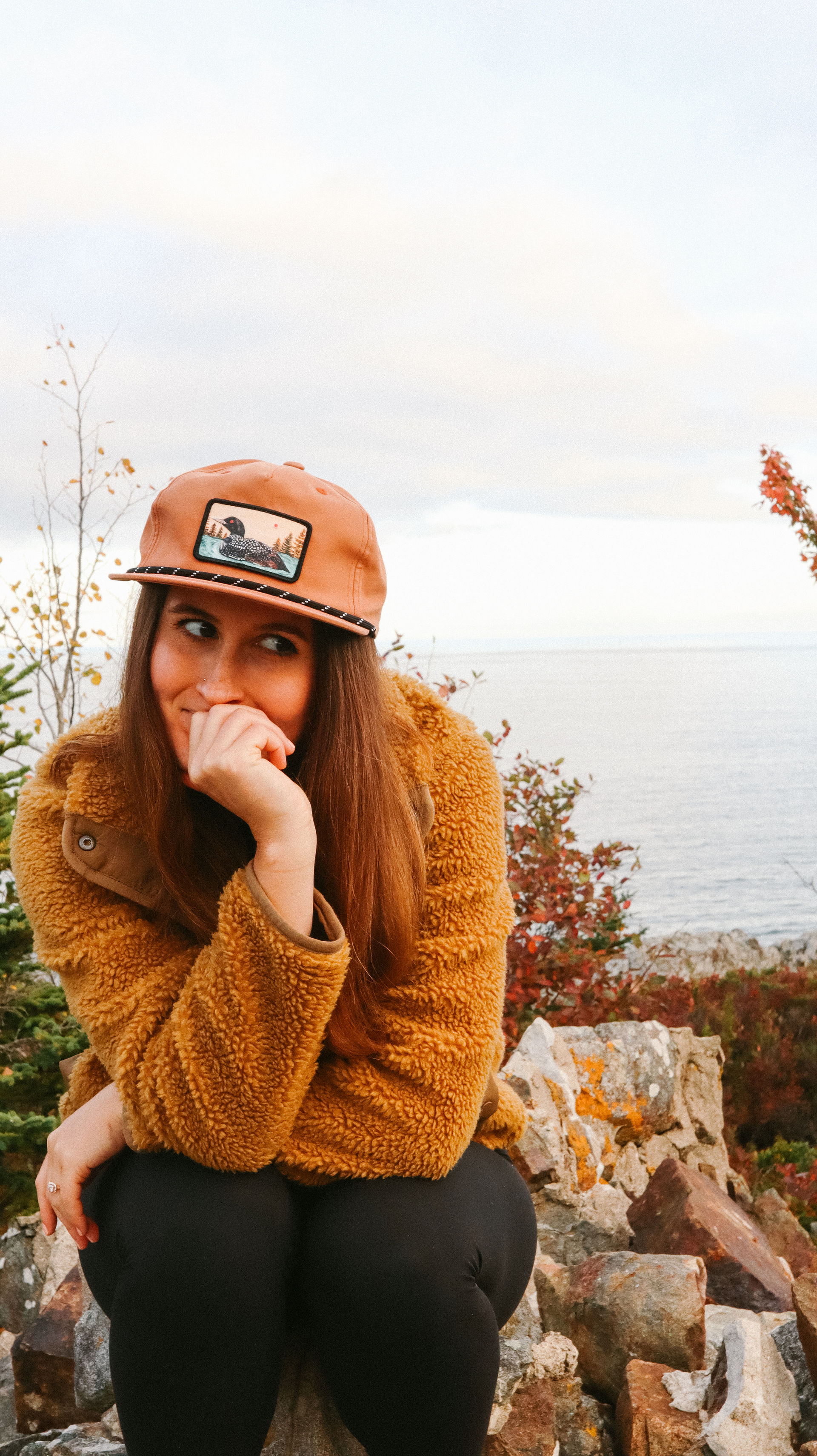 Grace on the rocky shore of Acadia in autumn