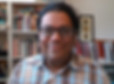 Sunil Aggarwal profile photo in front of bookshelf