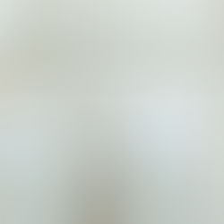 couture wedding dresses hanging on a rack