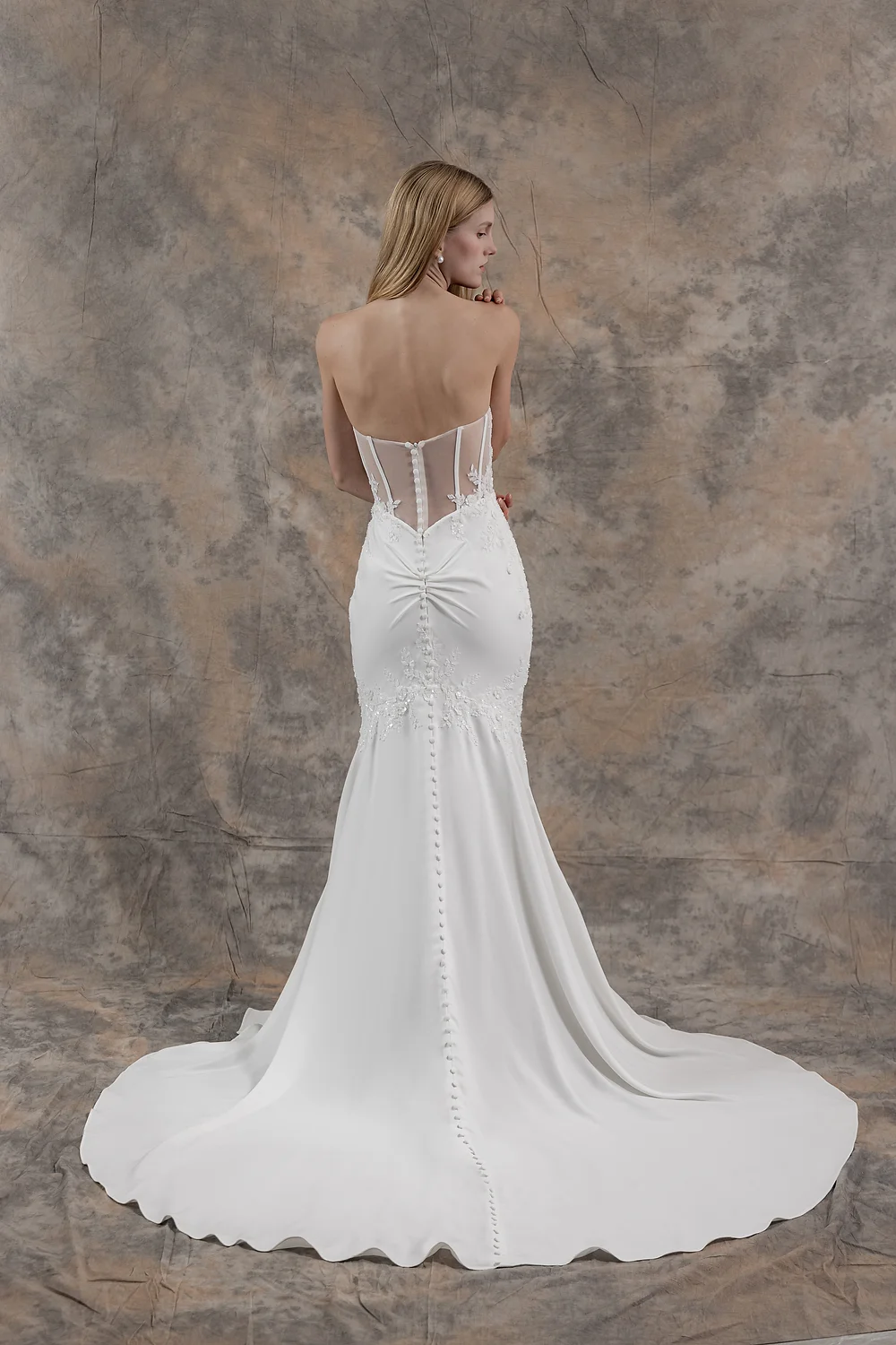 Ruched fit and flare wedding gown with corset bodice