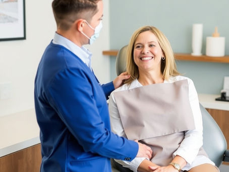 Austin dental patient discussing implant financing options without credit requirements.