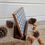 Thumbnail: side view of a wooden dining placemat holder handcrafed from upcycled reclaimed wooden pallets