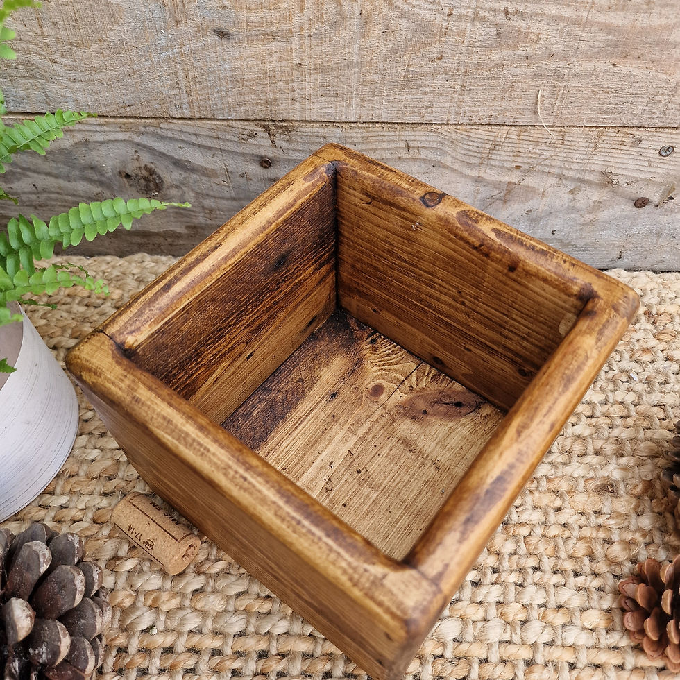Thumbnail: Close up of handmade wooden storage box, finished in dark oak wax and styled on a hessian rug 