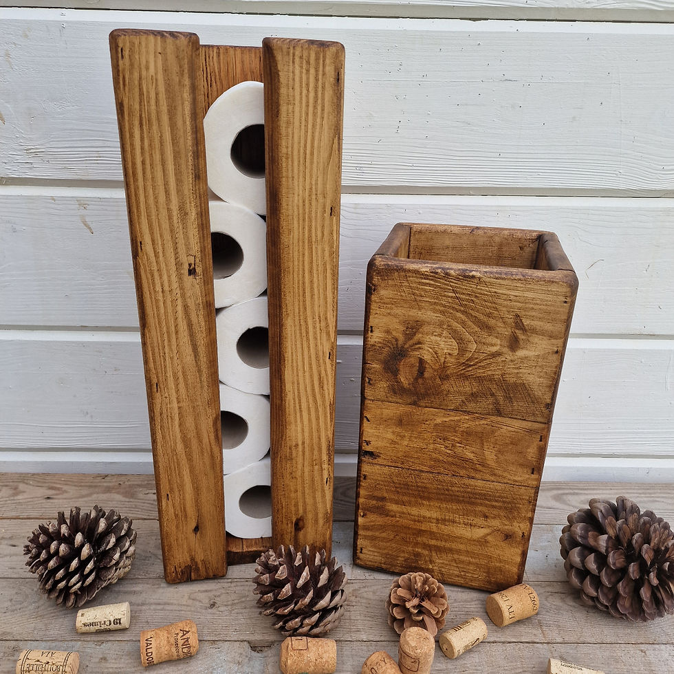 A rustic wooden toilet roll holder and brush holder crafted from reclaimed wooden pallets, agaist a white background