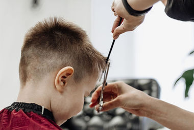 close-up-of-woman-hands-grooming-kid-boy-hair-in-b-2022-02-18-15-27-04-utc (1).jpeg