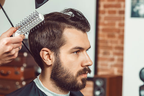 the-hands-of-young-barber-making-haircut-attractiv-2021-08-26-17-41-15-utc.jpeg