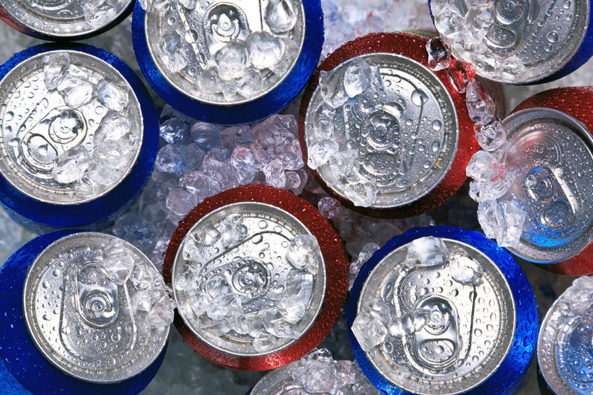 Cans of soft drinks in ice