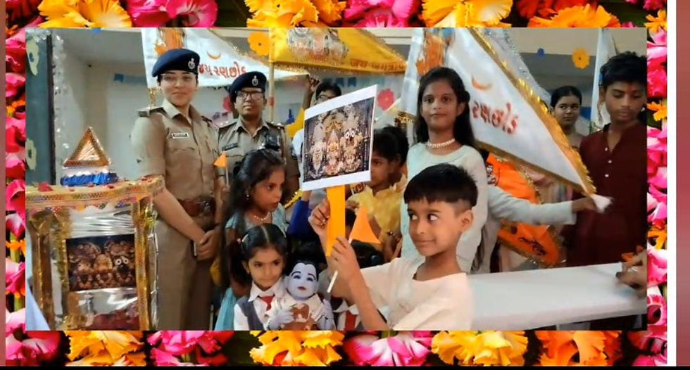 Children and police pose at a colorful indoor celebration, with flags, posters, and Gujarati text; a boy holds a sign.