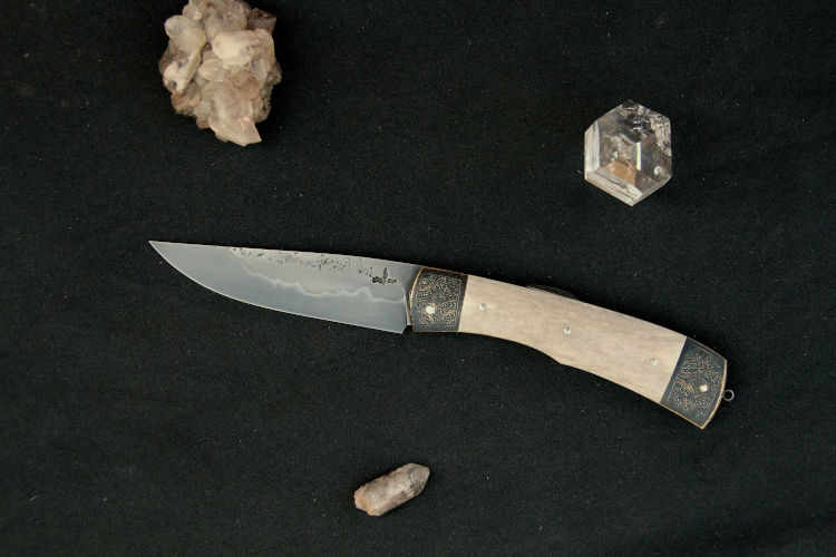 couteau à pompe centrale