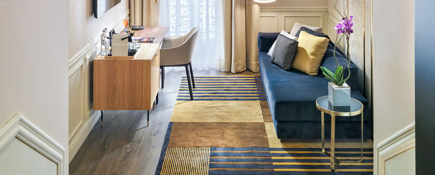 Elegant hotel in Barcelona's Eixample with rooftop terrace and historic architecture