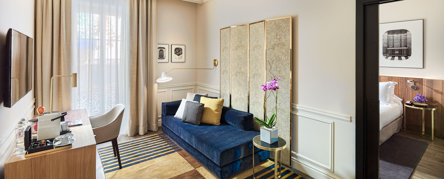 Elegant hotel in Barcelona's Eixample with rooftop terrace and historic architecture