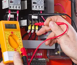 Electrician Testing Wires - Fixing Panel