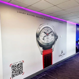 a wall that says luxury watches designed in london but inspired by newcastle