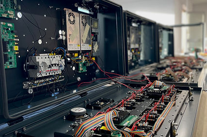 Mint+ engineering team showcasing modern public information display design in Athens office.