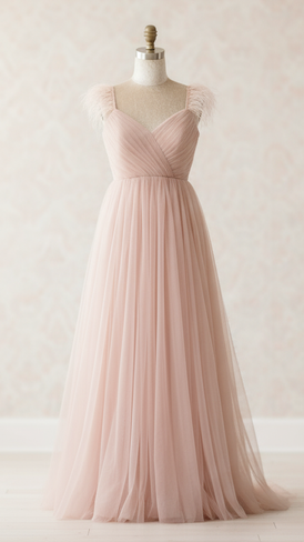 Pink tulle gown on mannequin in a softly lit room.