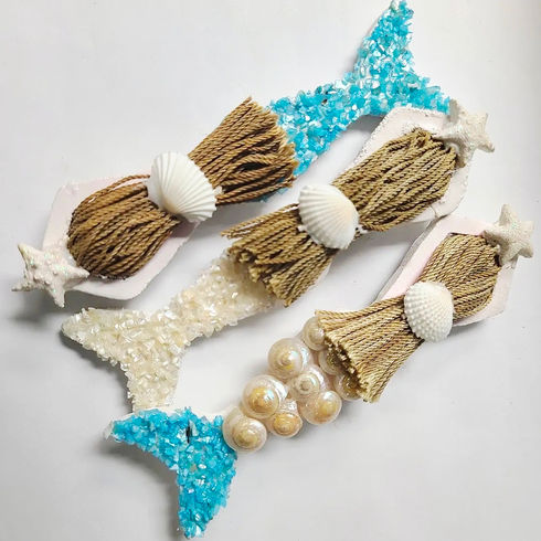Rustic wooden mermaid magnets with sea shells and twine