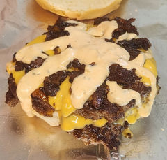food truck, smash burger, scratch-made sauce, cheese.