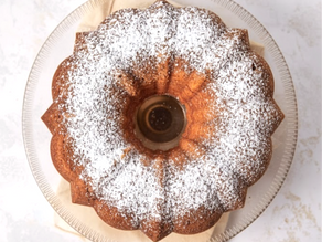 A bundt cake with powdered sugar topping