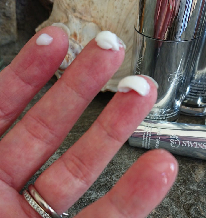 swiss clinic products on fingers