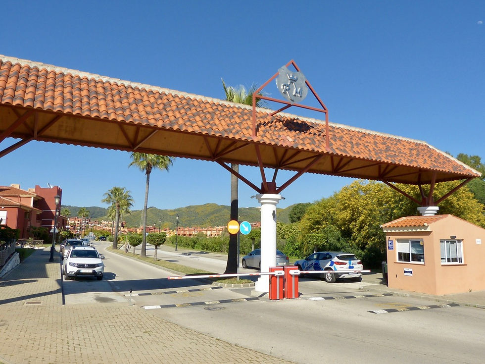 A view of the secuity gated entrance at La Reserva de Marbella