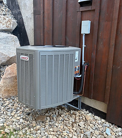 Air conditioner installed outside of a home