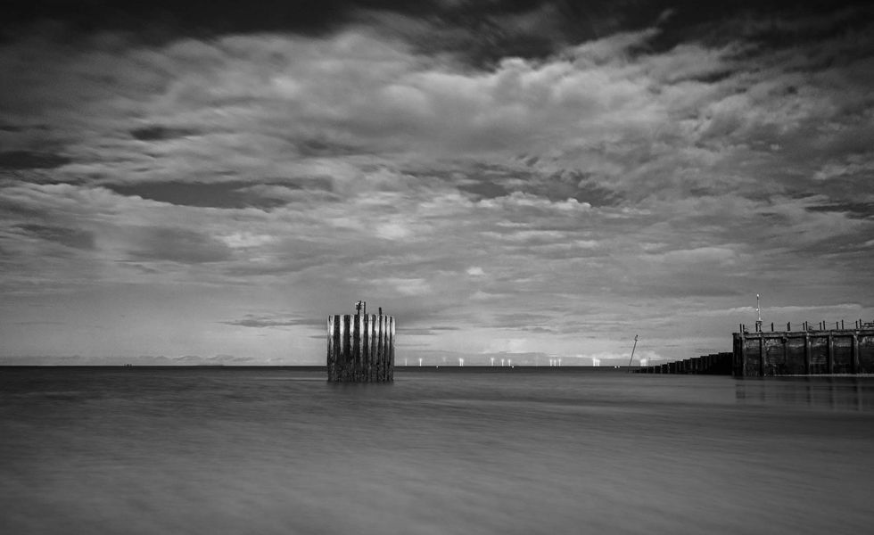 Entrance to Whitstable harbour with 'The Dolphin'