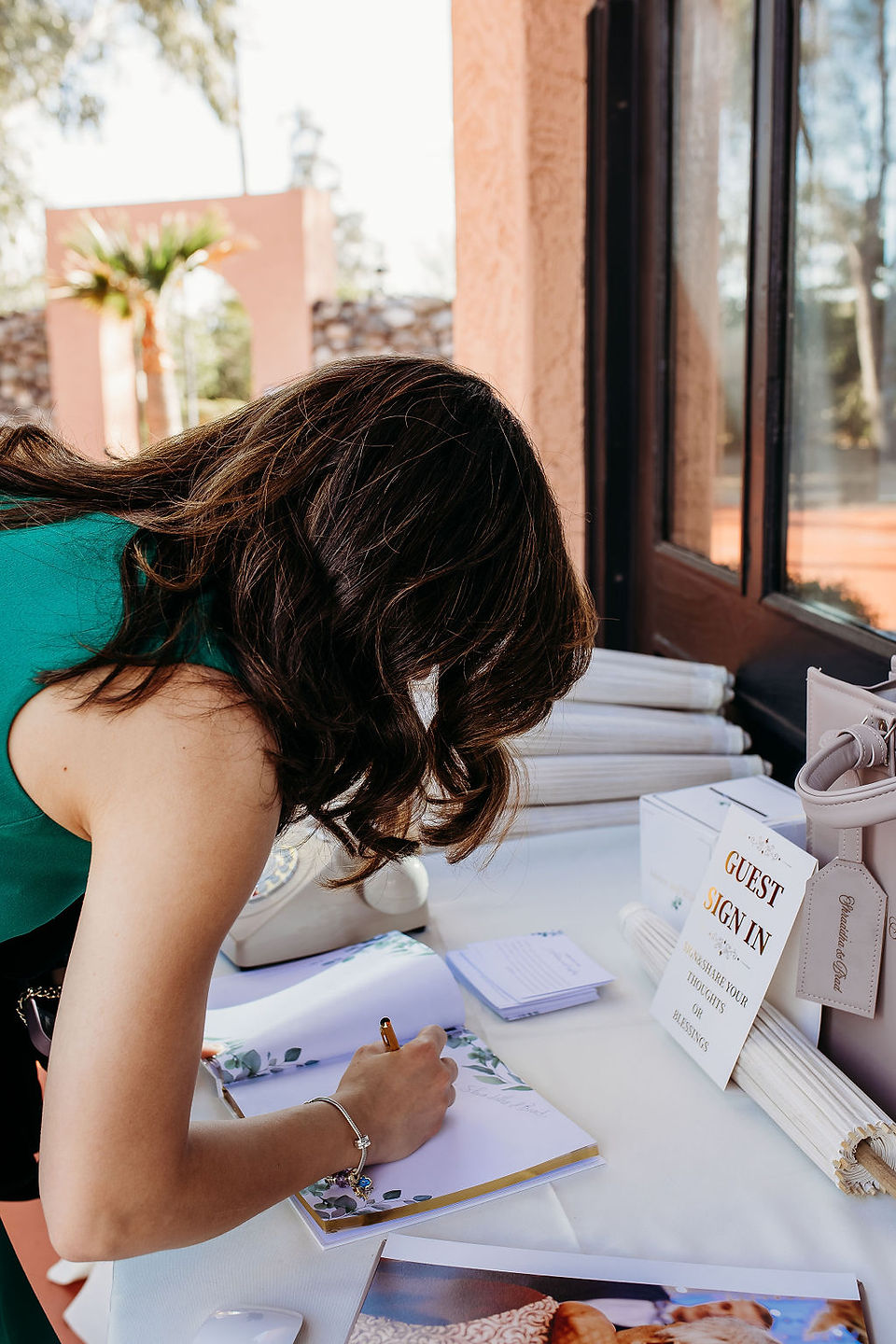 north valley garden reception, guest signing guest book, outdoor wedding