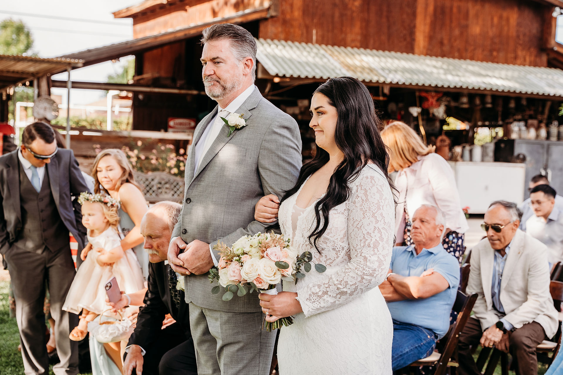 bride walking down the aisle at arizona backyard wedding