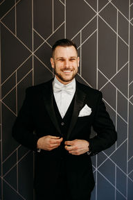 groom in black tux, arizona wedding photographer