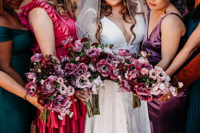bridal party, purple bouquets, jewel toned wedding party dresses, arizona wedding photographer