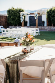 wedding details for a brunch wedding, tablesetting with wildflowers and sage green runner