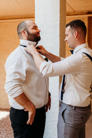groom getting ready at Crowne Plaza San Marcos Golf Resort