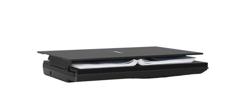 Canon CanoScan LiDE 300 scanning a document – high-speed scanning with advanced image correction and OCR support.