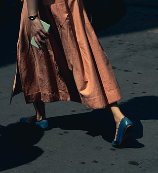 Woman Walking with Blue Shoes