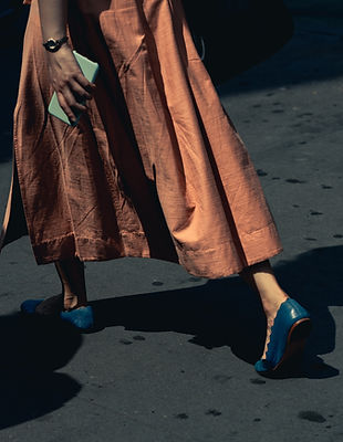 Woman Walking with Blue Shoes