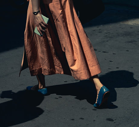 Woman Walking with Blue Shoes