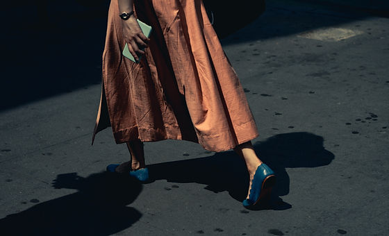 Woman Walking with Blue Shoes