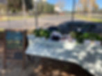 Southside FM - table at a Farmer's Market with fresh produce