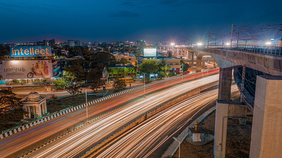 Long exposure night infrastructure photograph of metro rail construction in Chennai with light trails by Arun Siddharth