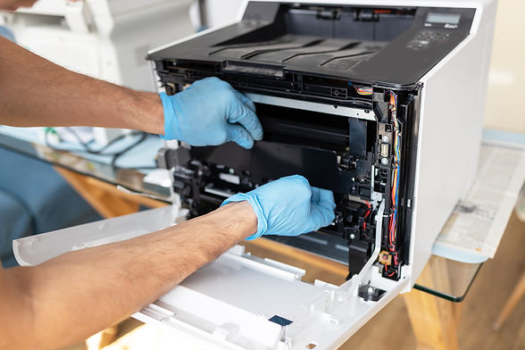 Technician hand open cover photocopier or photocopy to fix repair copier problem paper jam